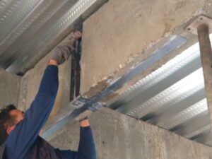 Reparación Estructural y Reforzamiento por medio instalación placa fibra de carbono, colegio inglés Iquique